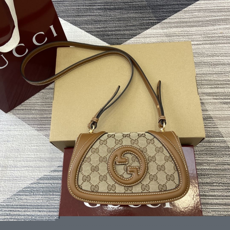 G*u*i satchel bags